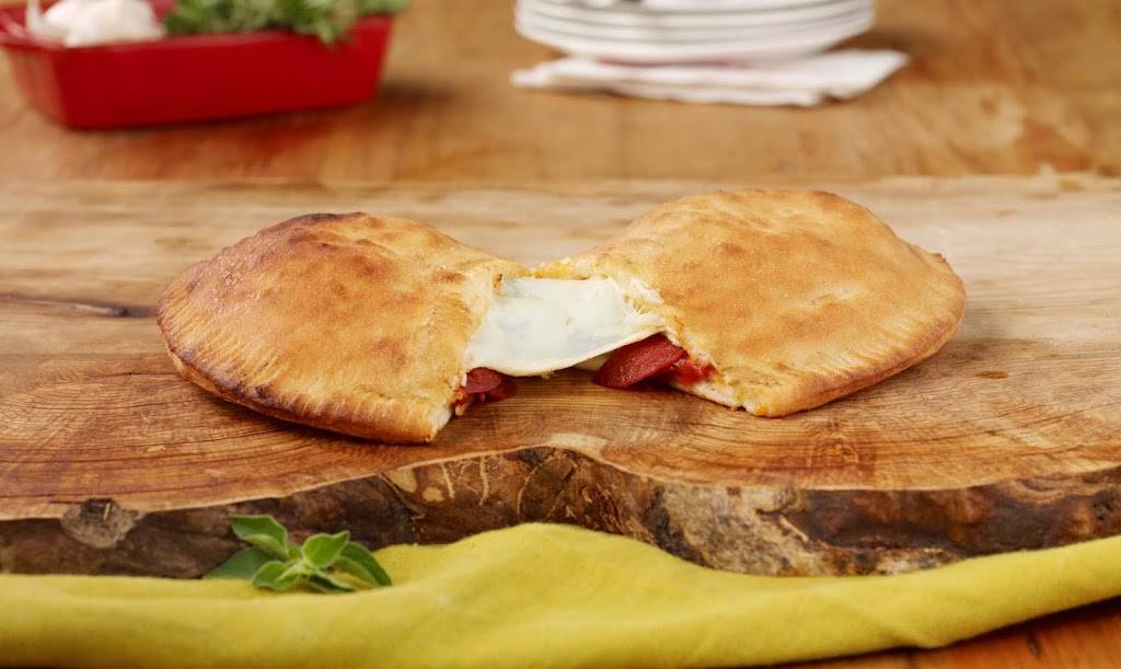 Ginos Pizza | restaurant | 24 Main St E, Grimsby, ON L3M 1M8, Canada | 8663104466 OR +1 866-310-4466