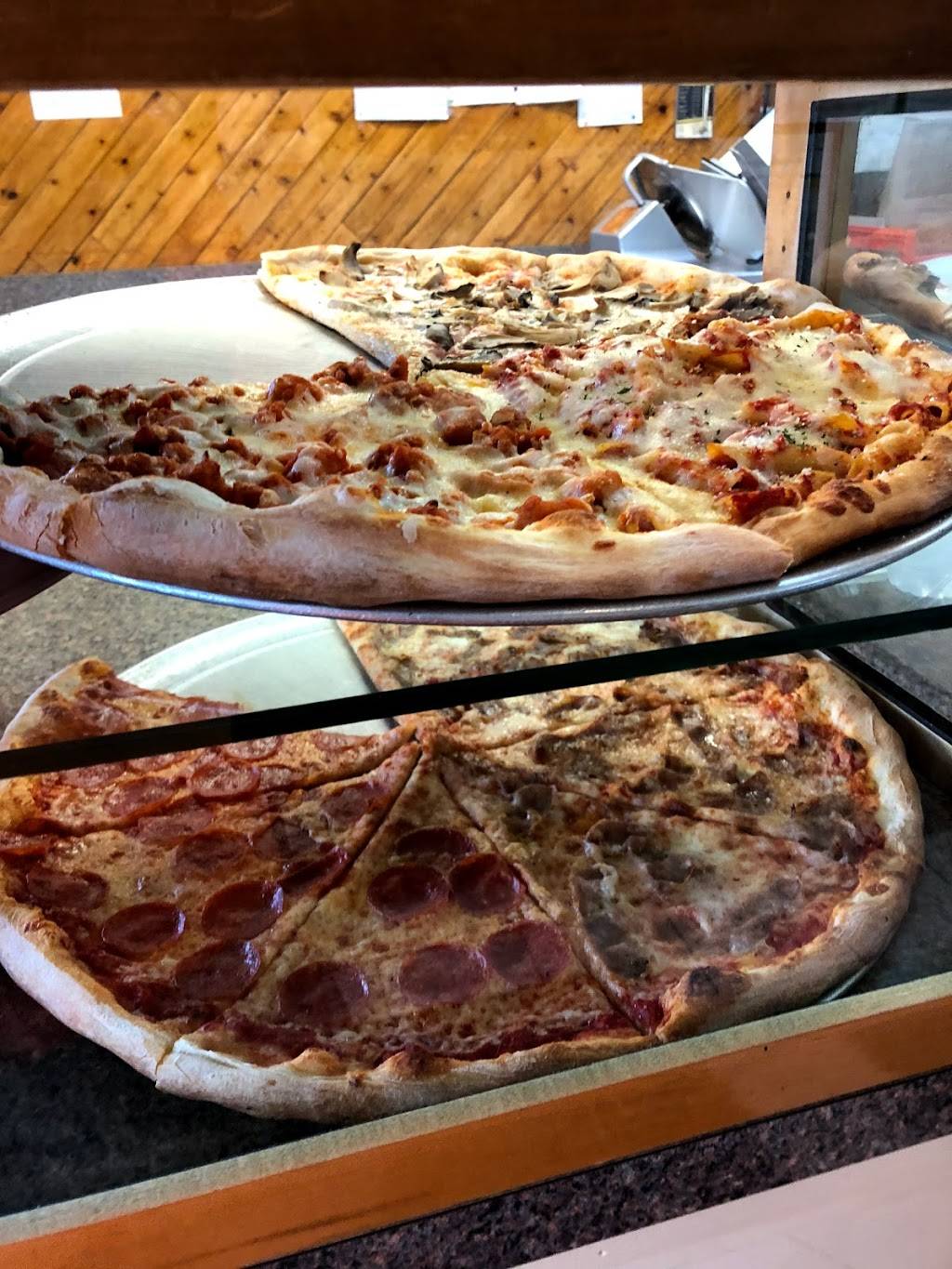 Marios Famous Pizzeria | restaurant | 1279 Broad St, Bloomfield, NJ 07003, USA | 9733384477 OR +1 973-338-4477