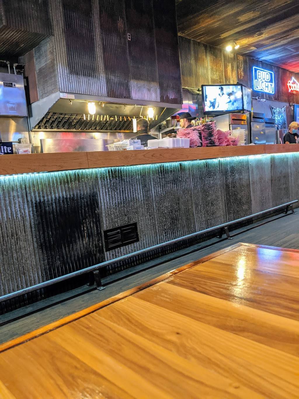 The Cockeyed Pig Dive Bar and Grille | restaurant | 325 New York Ave, Holton, KS 66436, USA | 7853643400 OR +1 785-364-3400